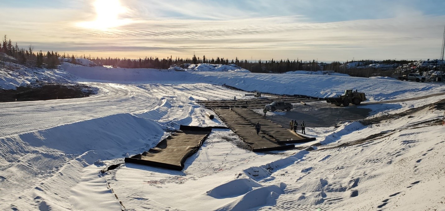 Workers are fusing together sections of the liner into the bottom of the non-hazardous waste landfill as part of the design installation